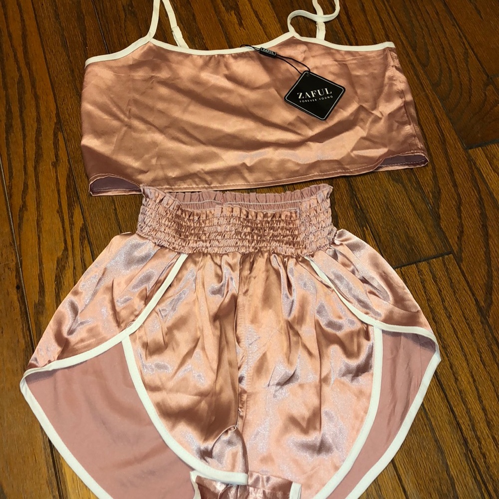 Pink metallic shorts and top